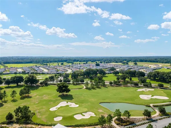 a view of a lake with a city