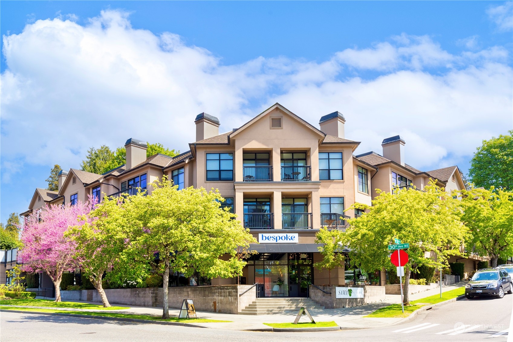 5000 30th Avenue Northeast, Unit 302 Seattle, WA 98105 - Photo 1 of 21 a front view of a building with street view and trees
