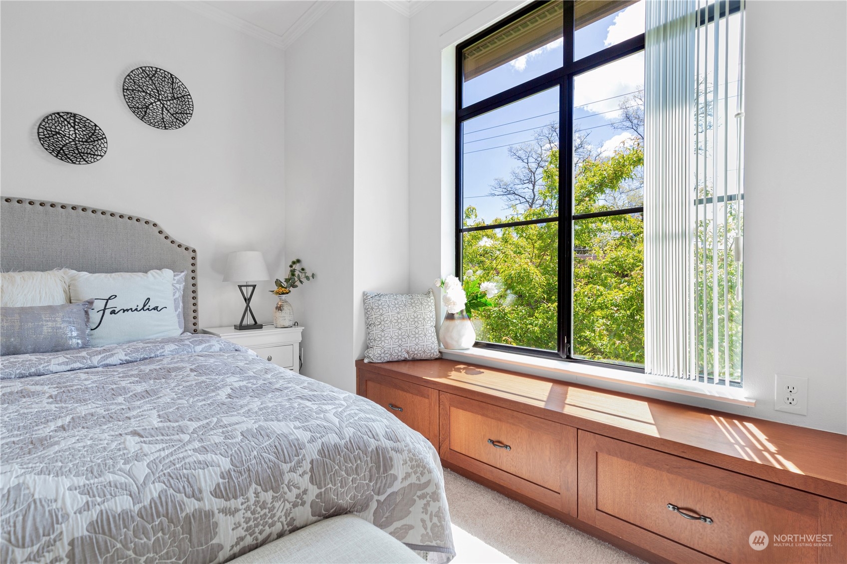 5000 30th Avenue Northeast, Unit 302 Seattle, WA 98105 - Photo 11 of 21 a bedroom with a bed and a large window
