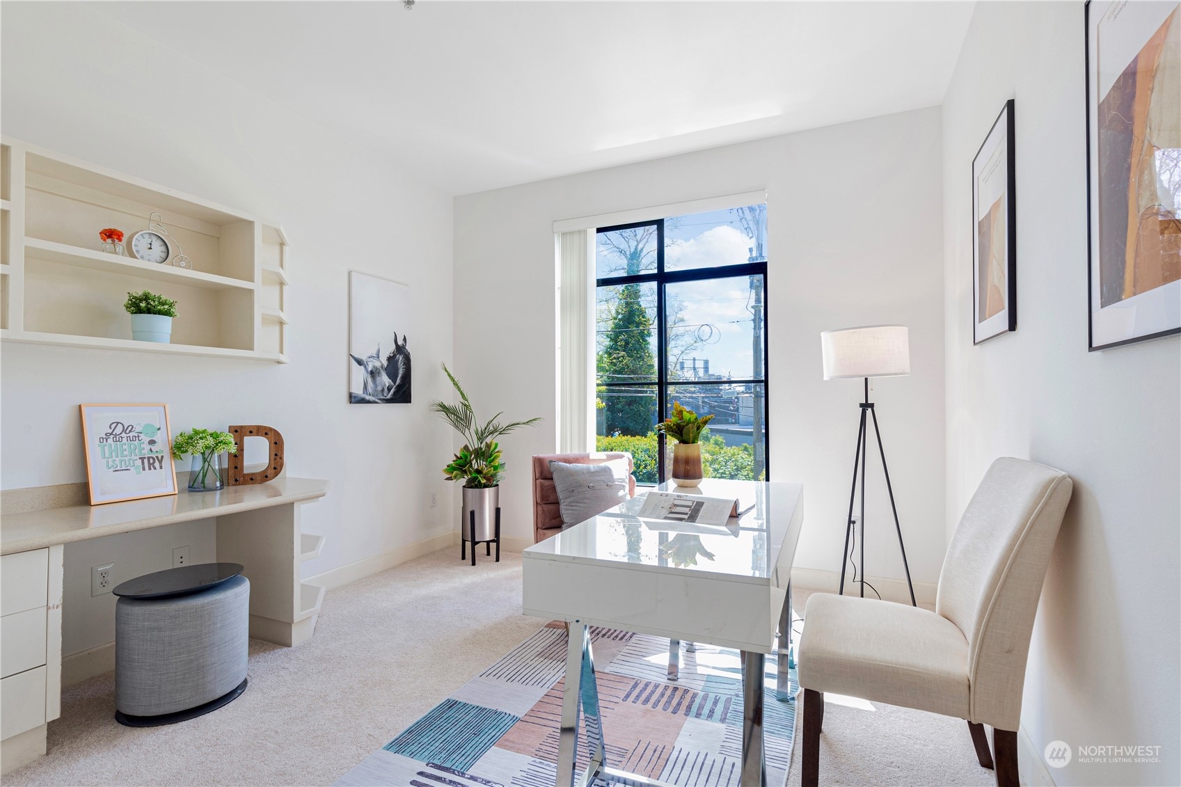 5000 30th Avenue Northeast, Unit 302 Seattle, WA 98105 - Photo 13 of 21 a living room with furniture and a window