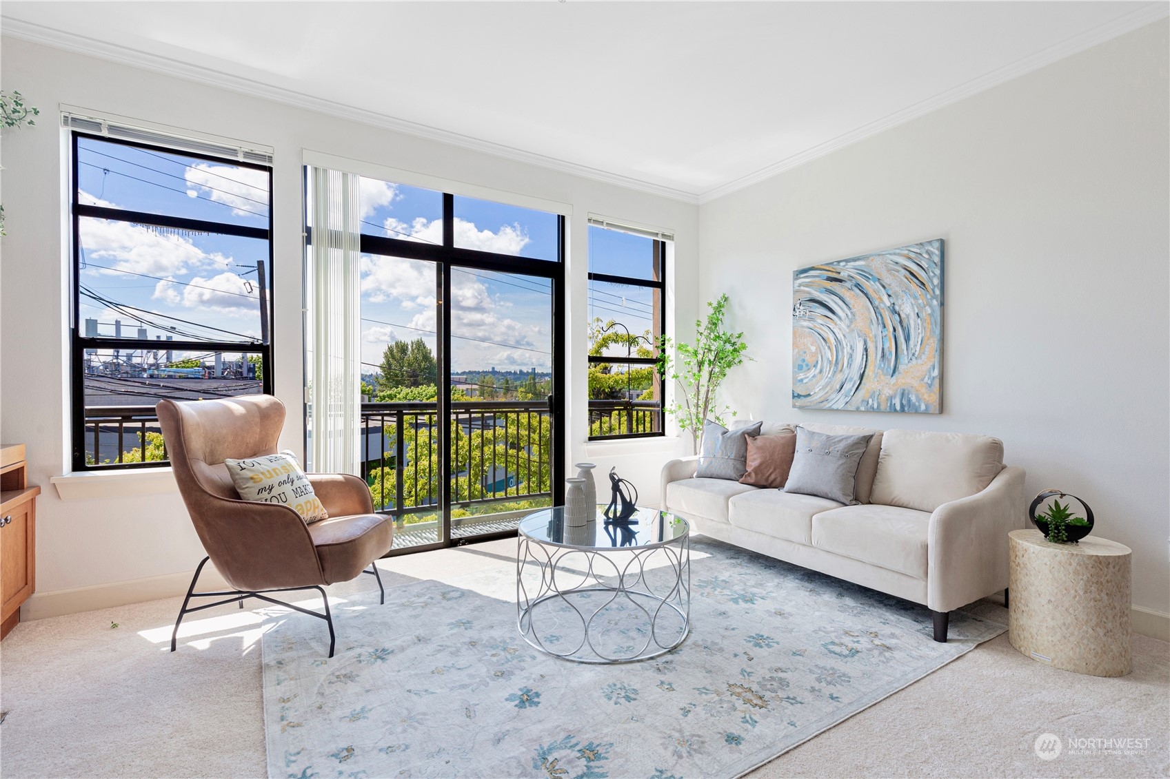 5000 30th Avenue Northeast, Unit 302 Seattle, WA 98105 - Photo 3 of 21 a living room with furniture and a large window