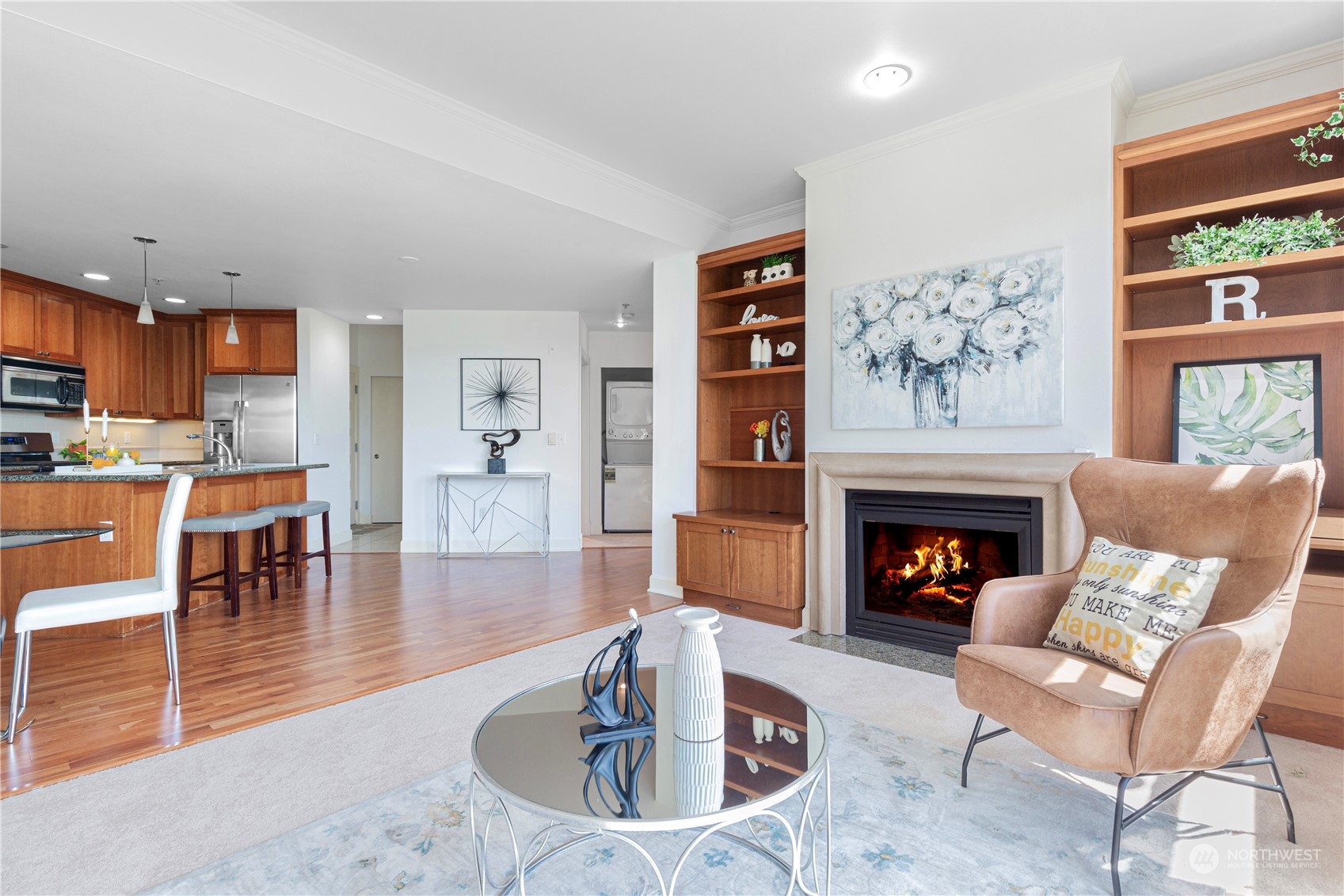 5000 30th Avenue Northeast, Unit 302 Seattle, WA 98105 - Photo 5 of 21 a living room with furniture and a fireplace