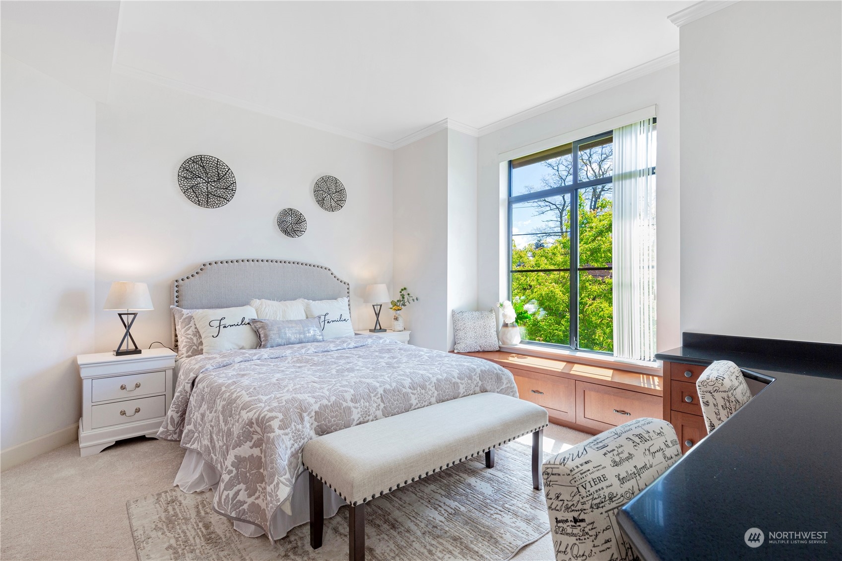 5000 30th Avenue Northeast, Unit 302 Seattle, WA 98105 - Photo 10 of 21 a bedroom with a bed and a window