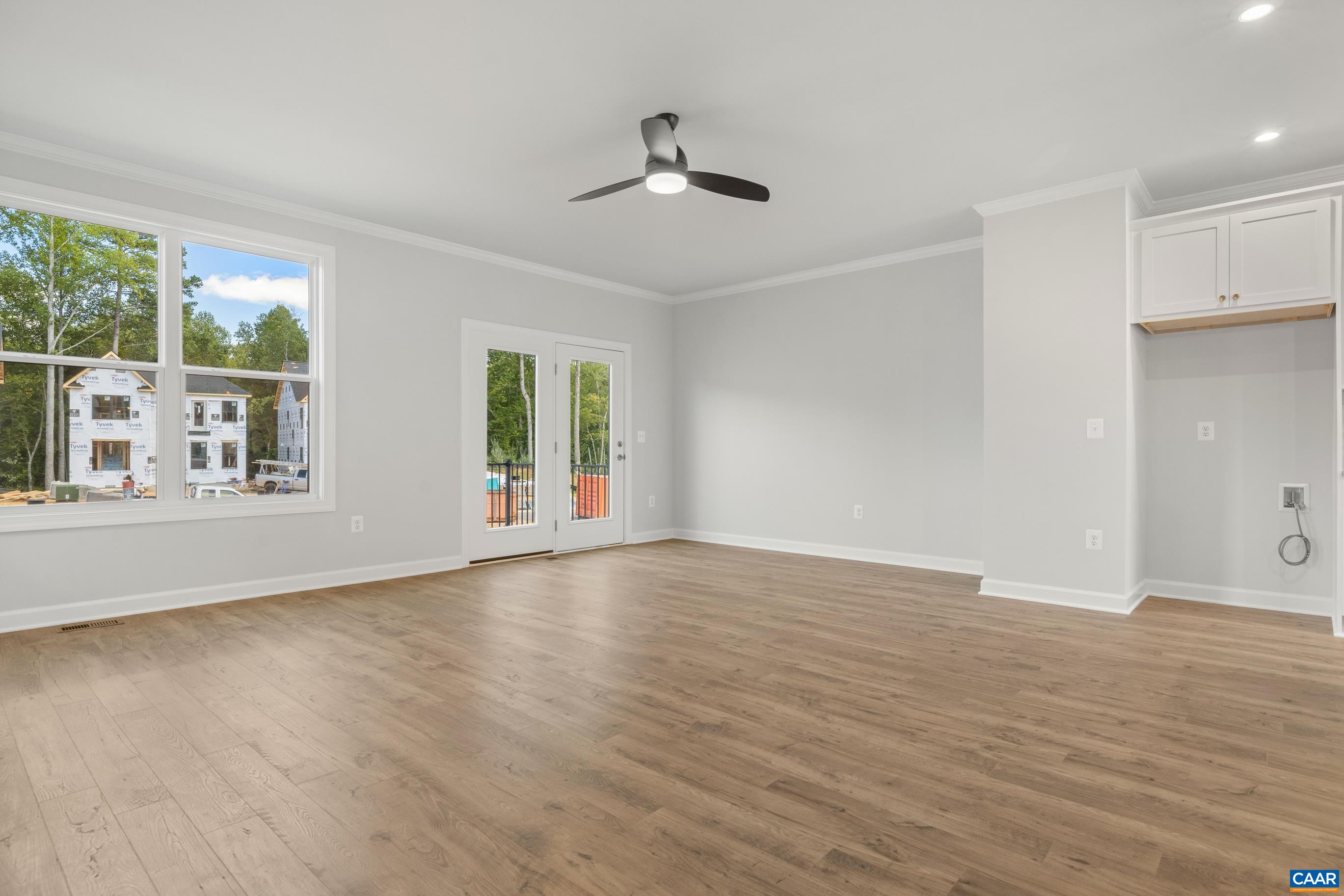 3207 Horizon Road Charlottesville, VA 22902 - Photo 11 of 37 a view of an empty room with wooden floor and a window