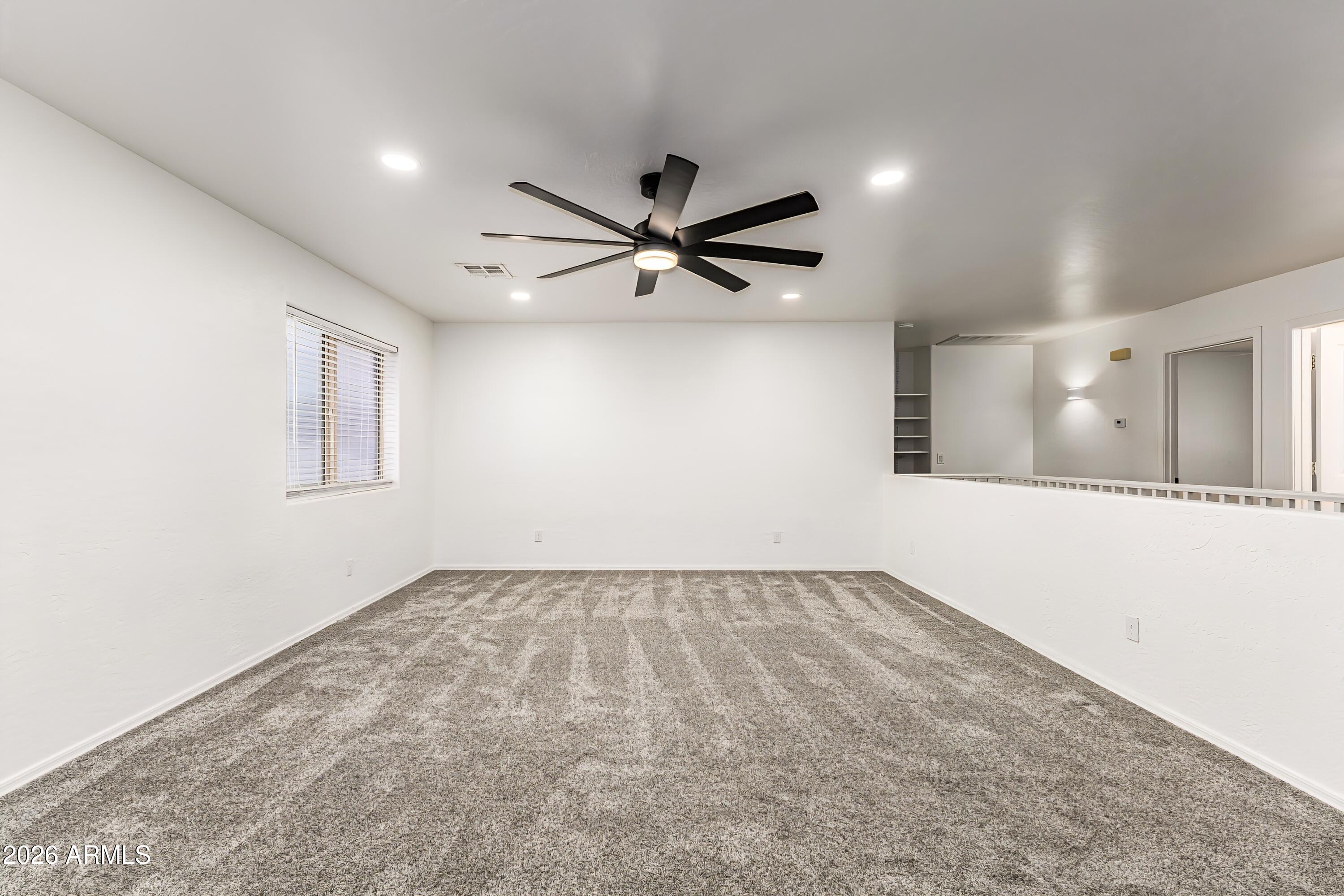 4208 South Sawmill Road Gilbert, AZ 85297 - Photo 15 of 46 a view of an empty room
