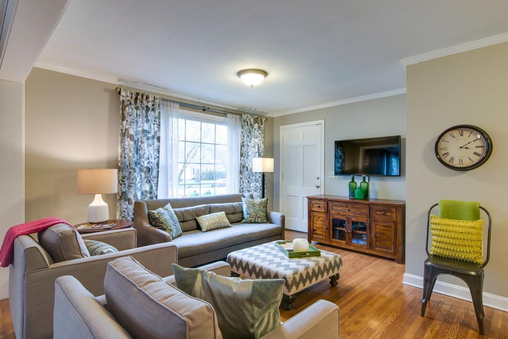 5561 Knob Road Nashville, TN 37209 - Photo 12 of 26 a living room with furniture and a fireplace