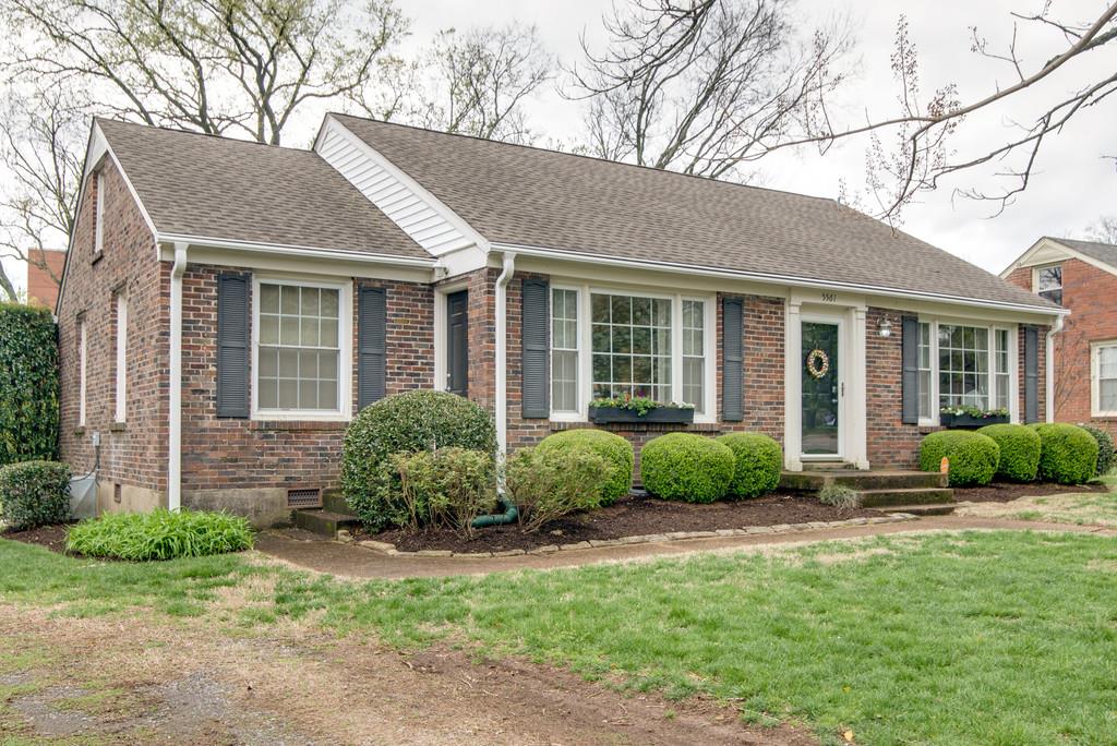 5561 Knob Road Nashville, TN 37209 - Photo 2 of 26 a front view of a house with garden