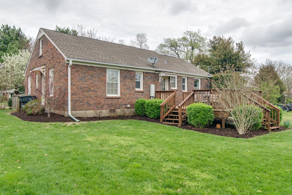 5561 Knob Road Nashville, TN 37209 - Photo 24 of 26 a view of a house with a yard and plants