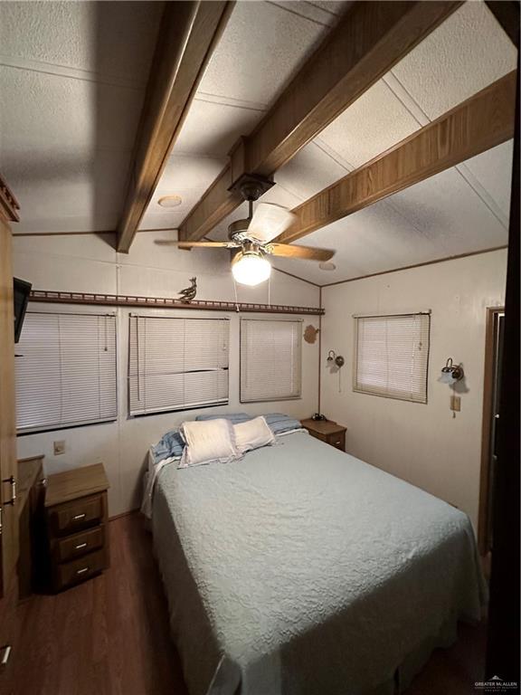 318 Sun Dial Circle Port Isabel, TX 78578 - Photo 5 of 8 a bedroom with a bed and a walk in closet