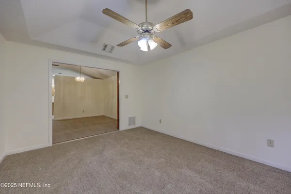 a backyard of a house with seating space