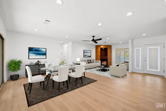a dining room with furniture and window