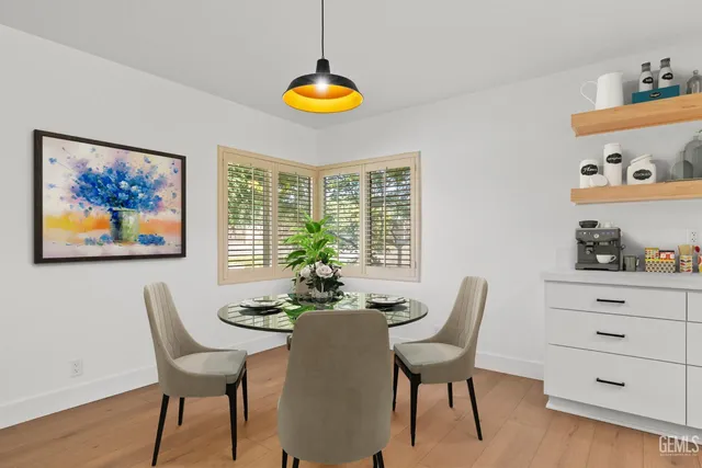 a kitchen with counter top space sink and center island