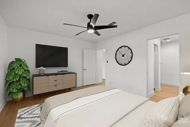 a view of a mirror light fixtures and entryway