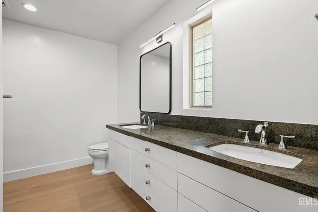 a bathroom with a sink and a toilet