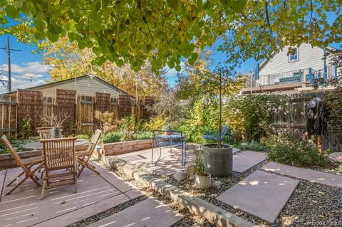 a view of a outdoor space with a patio and backyard