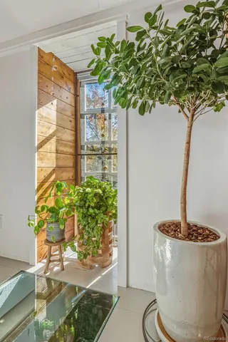 a view of a workspace with furniture