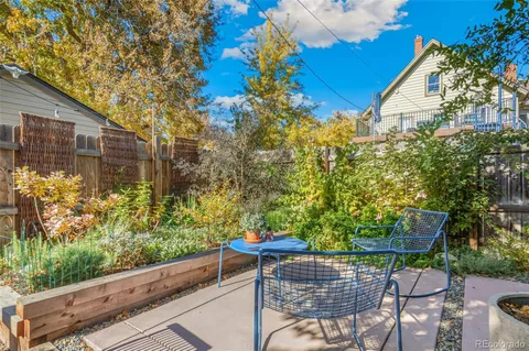a view of yard with patio