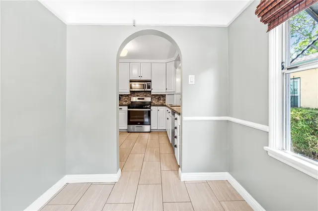 a view of a kitchen with a window