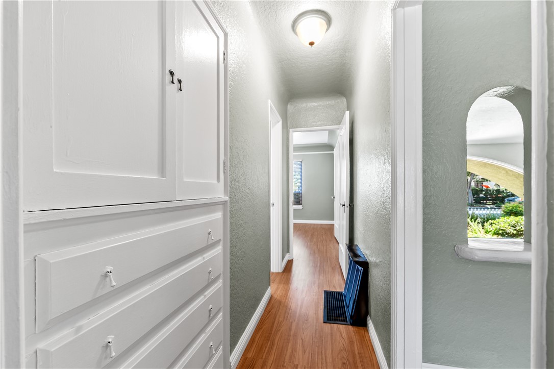 2109 Chestnut Avenue Long Beach, CA 90806 - Photo 19 of 32 a view of a hallway with wooden floor and staircase