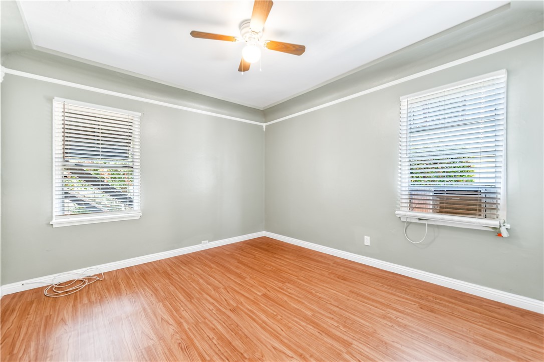 2109 Chestnut Avenue Long Beach, CA 90806 - Photo 20 of 32 a view of an empty room with window and wooden floor