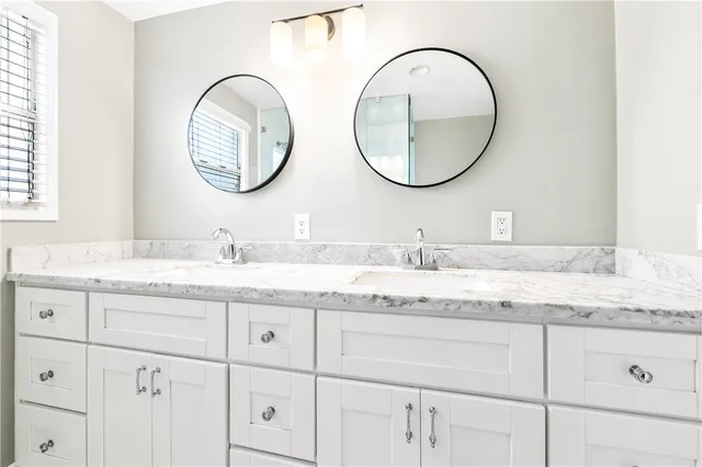 a view of a house with backyard sitting area and garden