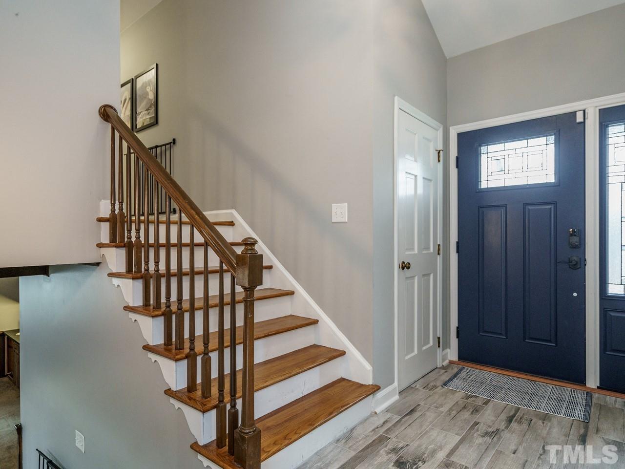 4109 Oak Park Road Raleigh, NC 27612 - Photo 12 of 28 a view of a hallway with staircase