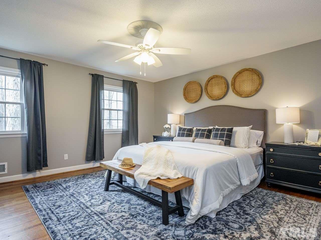 4109 Oak Park Road Raleigh, NC 27612 - Photo 13 of 28 a bedroom with a bed and window