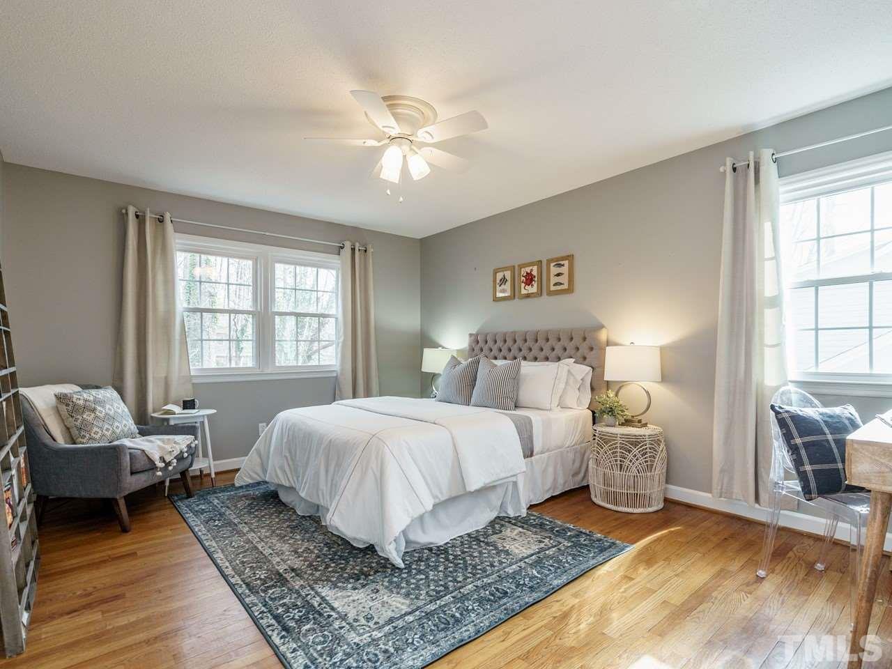 4109 Oak Park Road Raleigh, NC 27612 - Photo 19 of 28 a bedroom with a bed and a window