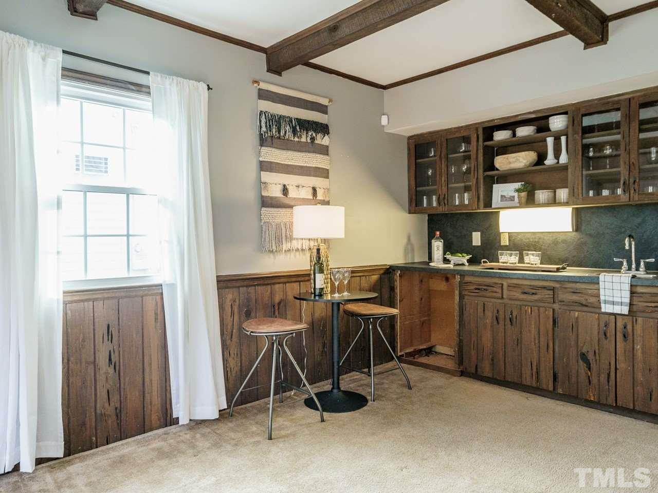 4109 Oak Park Road Raleigh, NC 27612 - Photo 22 of 28 a view of cabinets and window