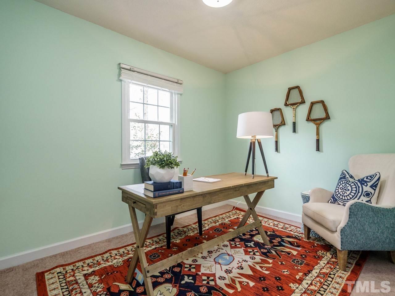 4109 Oak Park Road Raleigh, NC 27612 - Photo 25 of 28 a workspace with furniture and window
