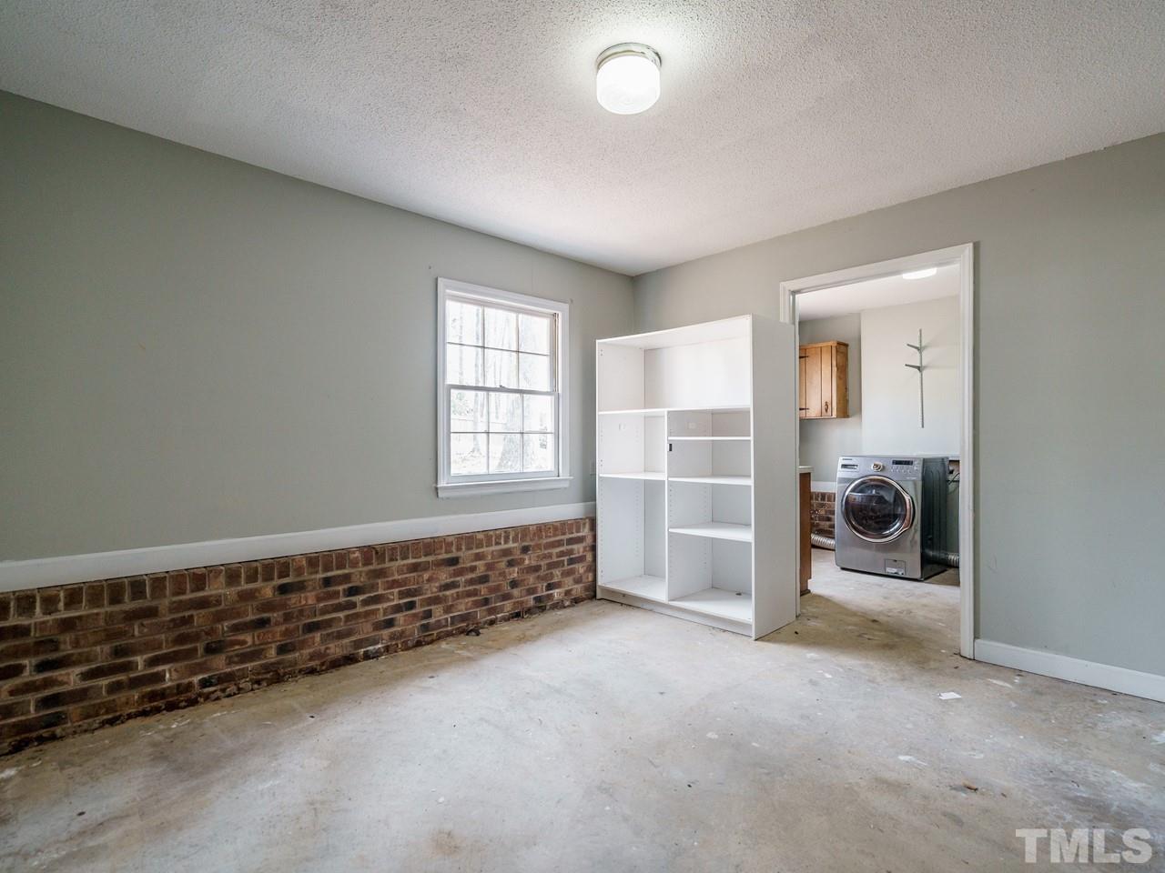 4109 Oak Park Road Raleigh, NC 27612 - Photo 27 of 28 wooden floor and closet in a room