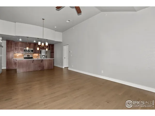 a view of a kitchen and a window