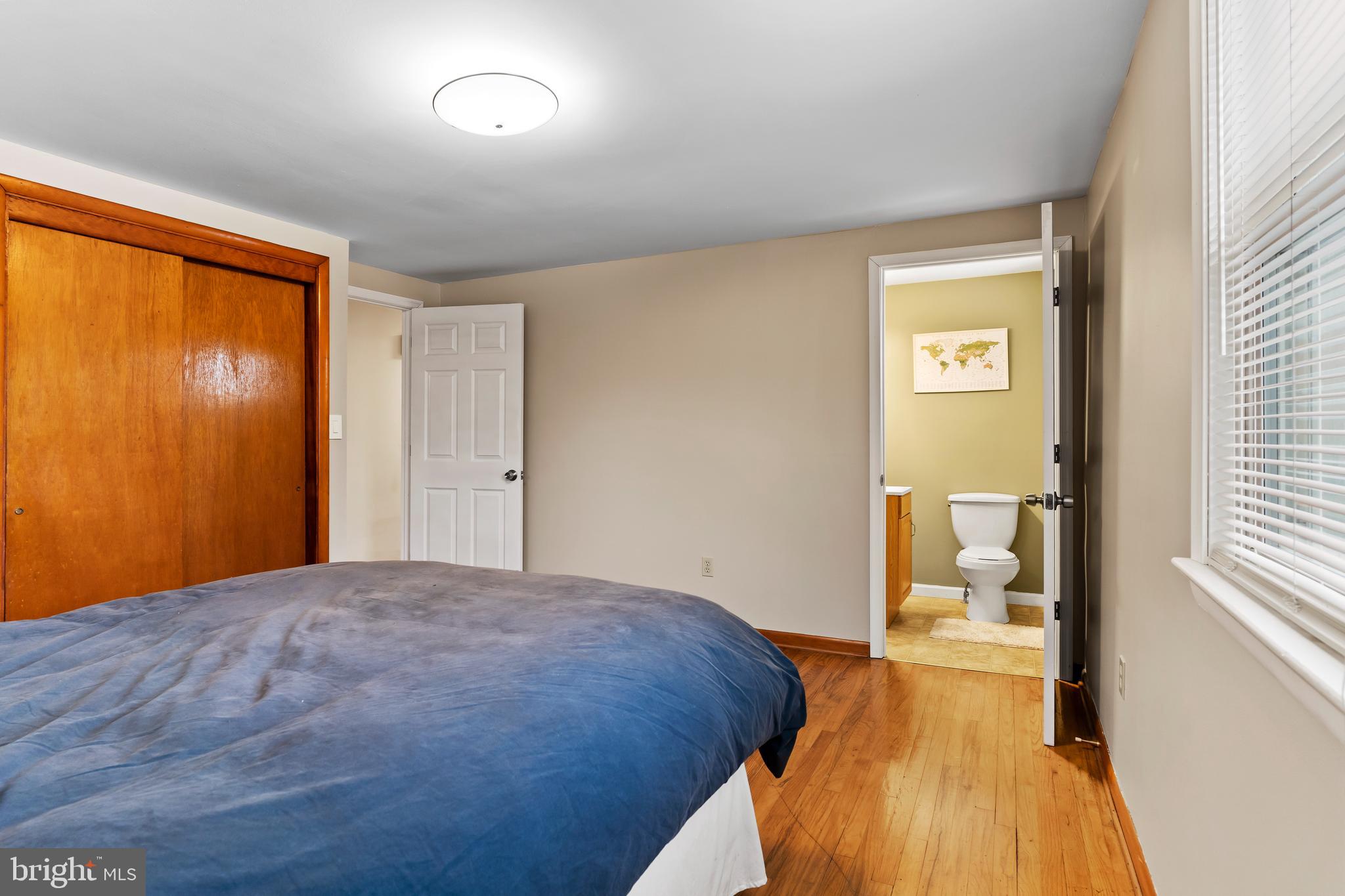 539 West Cumberland Road Enola, PA 17025 - Photo 15 of 26 a bedroom with a bed and a view of bathroom