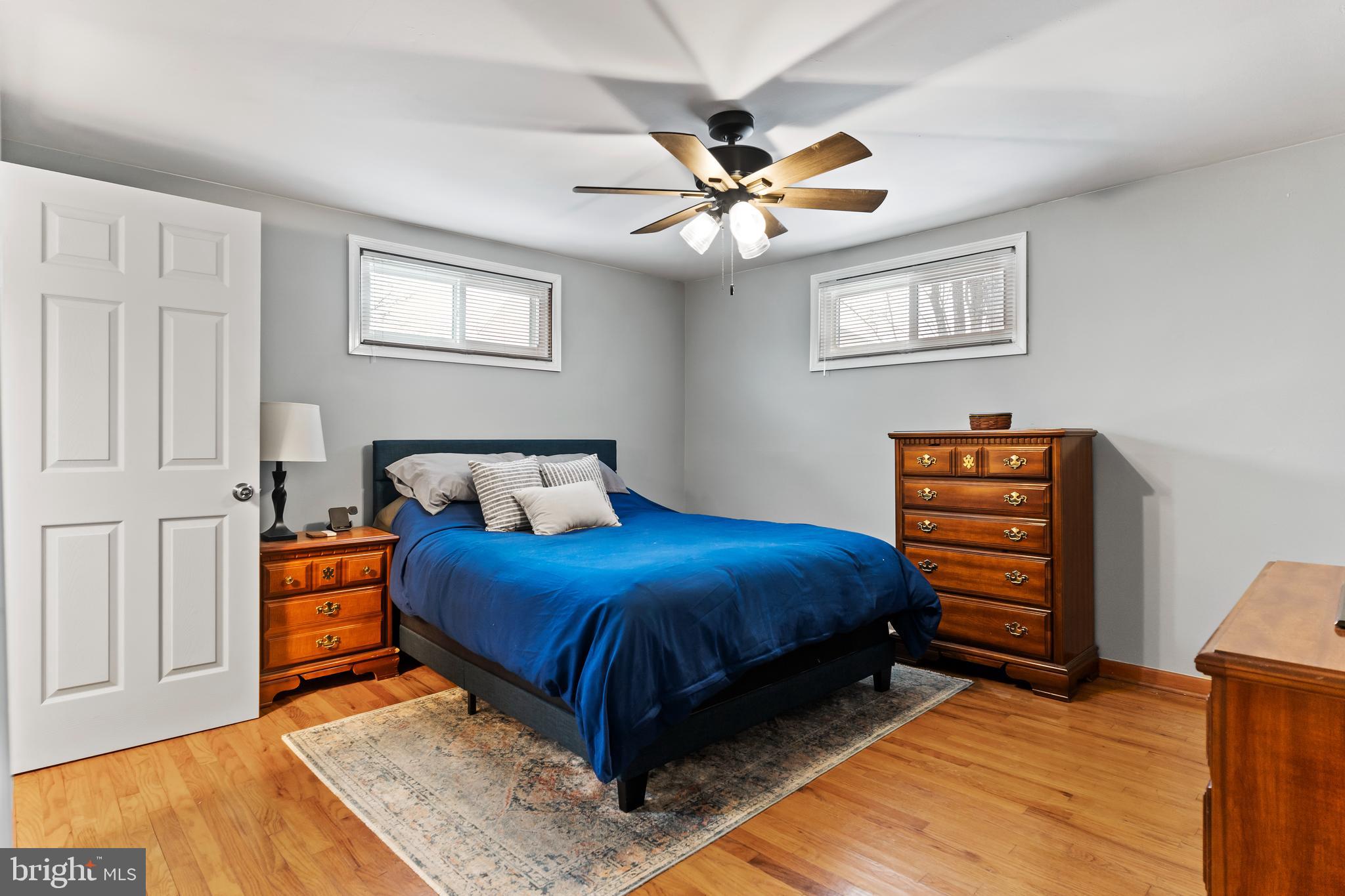 539 West Cumberland Road Enola, PA 17025 - Photo 17 of 26 a bedroom with a bed and wooden floor