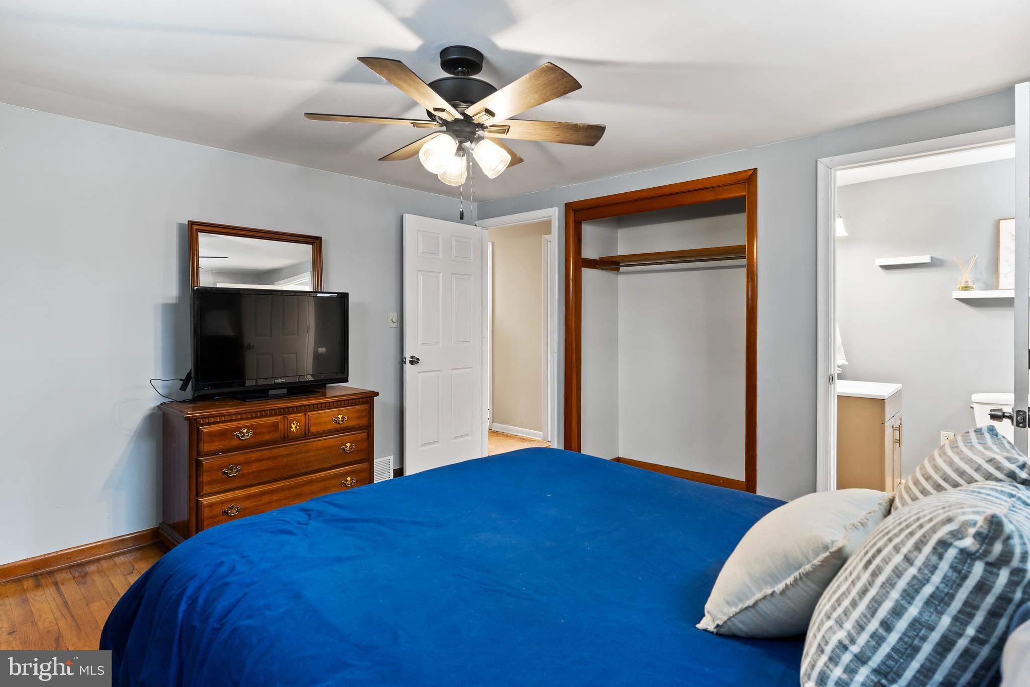 539 West Cumberland Road Enola, PA 17025 - Photo 18 of 26 a bedroom with a bed and a flat screen tv