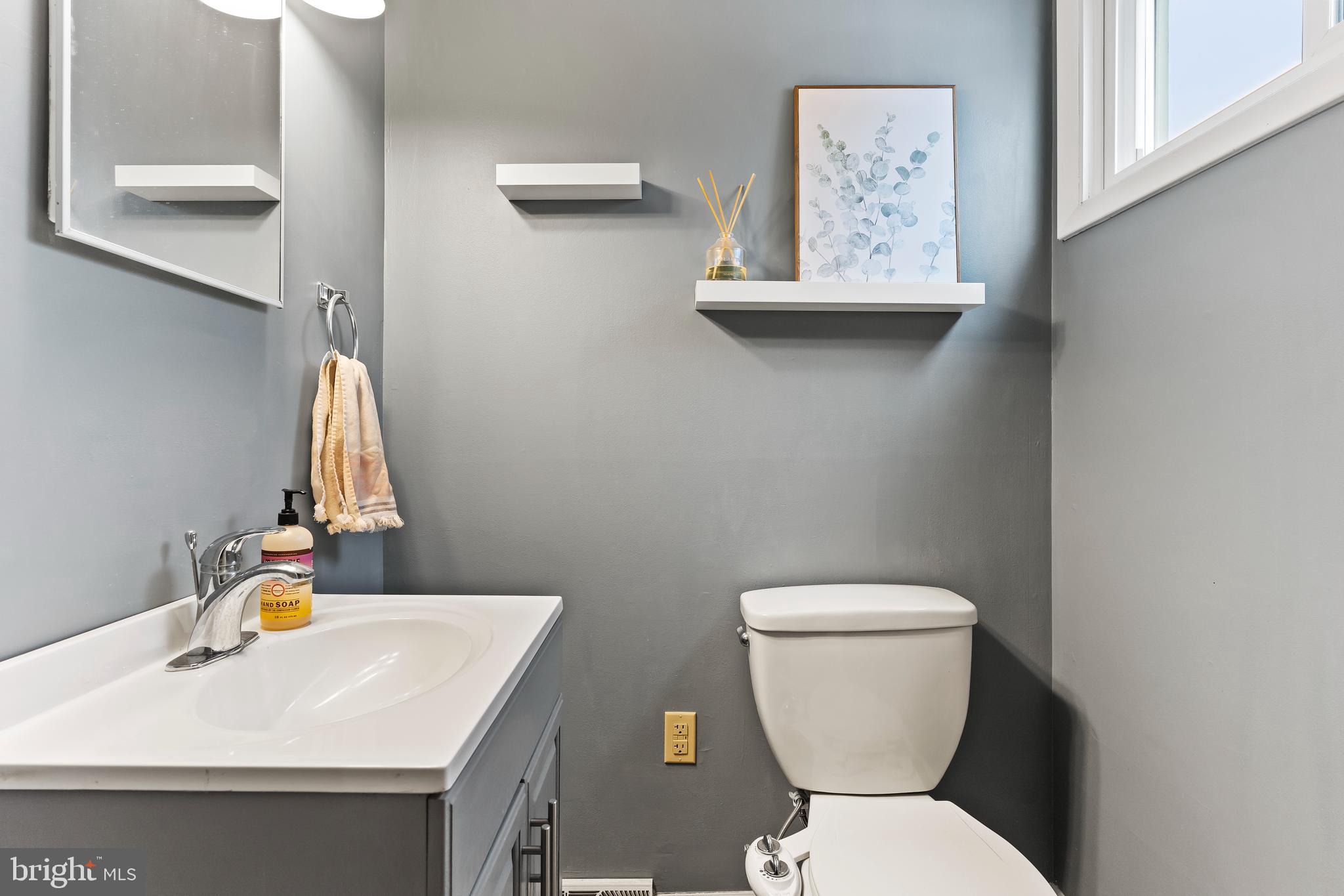 539 West Cumberland Road Enola, PA 17025 - Photo 19 of 26 a bathroom with a toilet sink and mirror