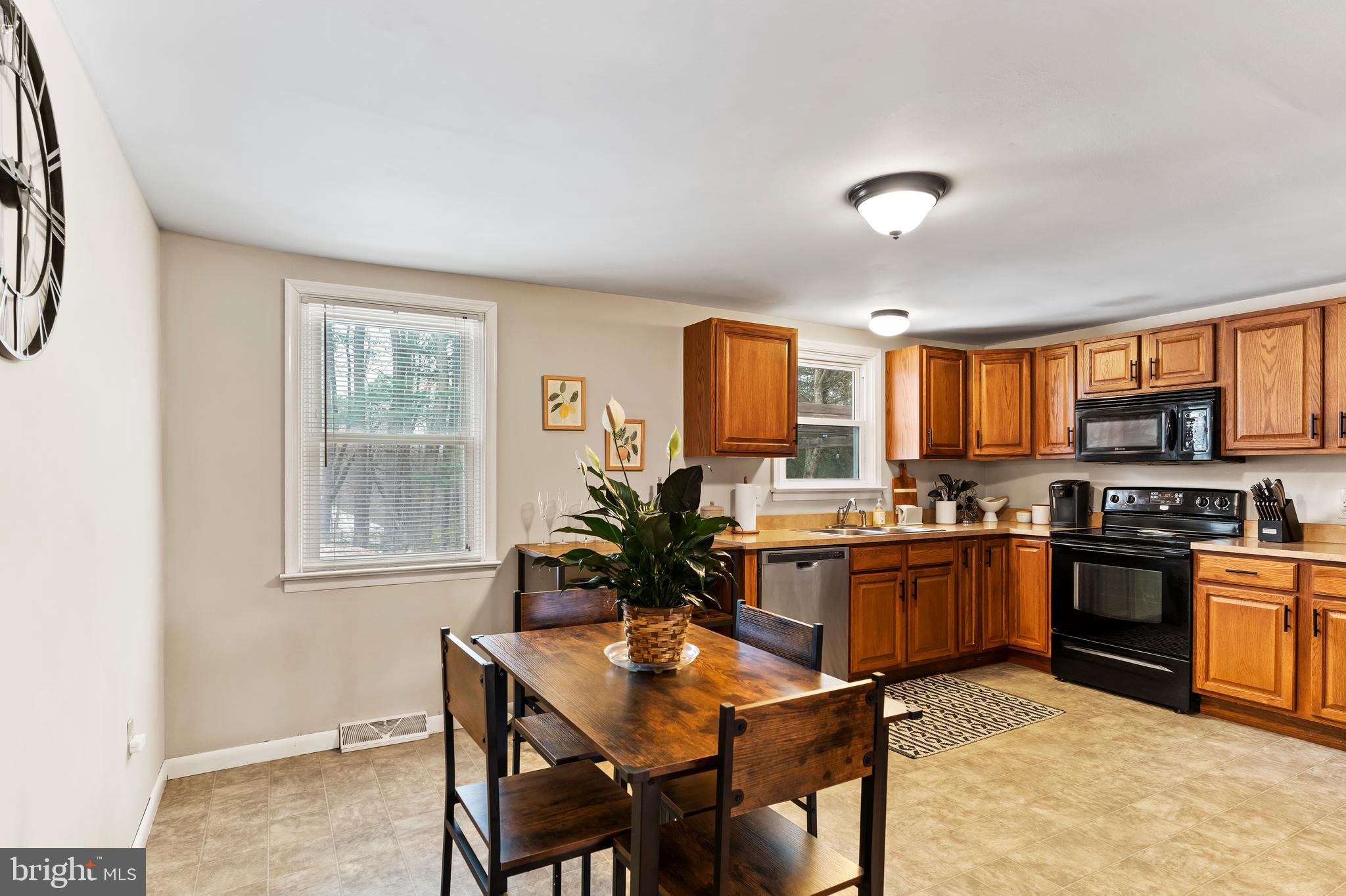 539 West Cumberland Road Enola, PA 17025 - Photo 9 of 26 a kitchen with stainless steel appliances granite countertop sink stove and refrigerator