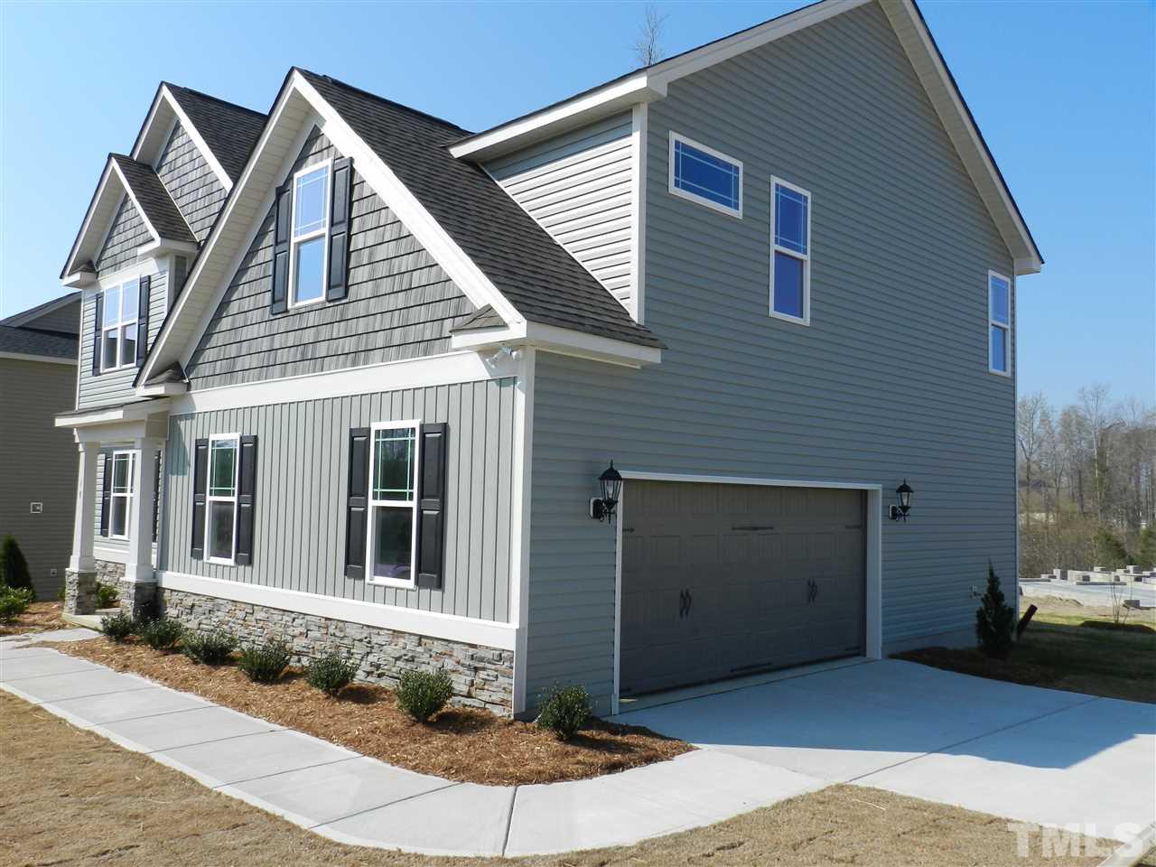 19 Labradoodle Court Garner, NC 27529 - Photo 2 of 9 a house view with a outdoor space