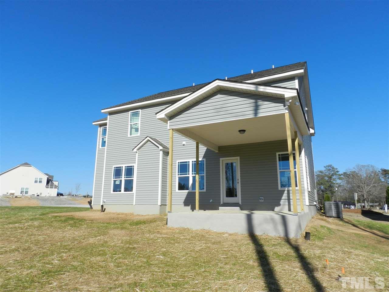 19 Labradoodle Court Garner, NC 27529 - Photo 3 of 9 a view of a house with a swimming pool