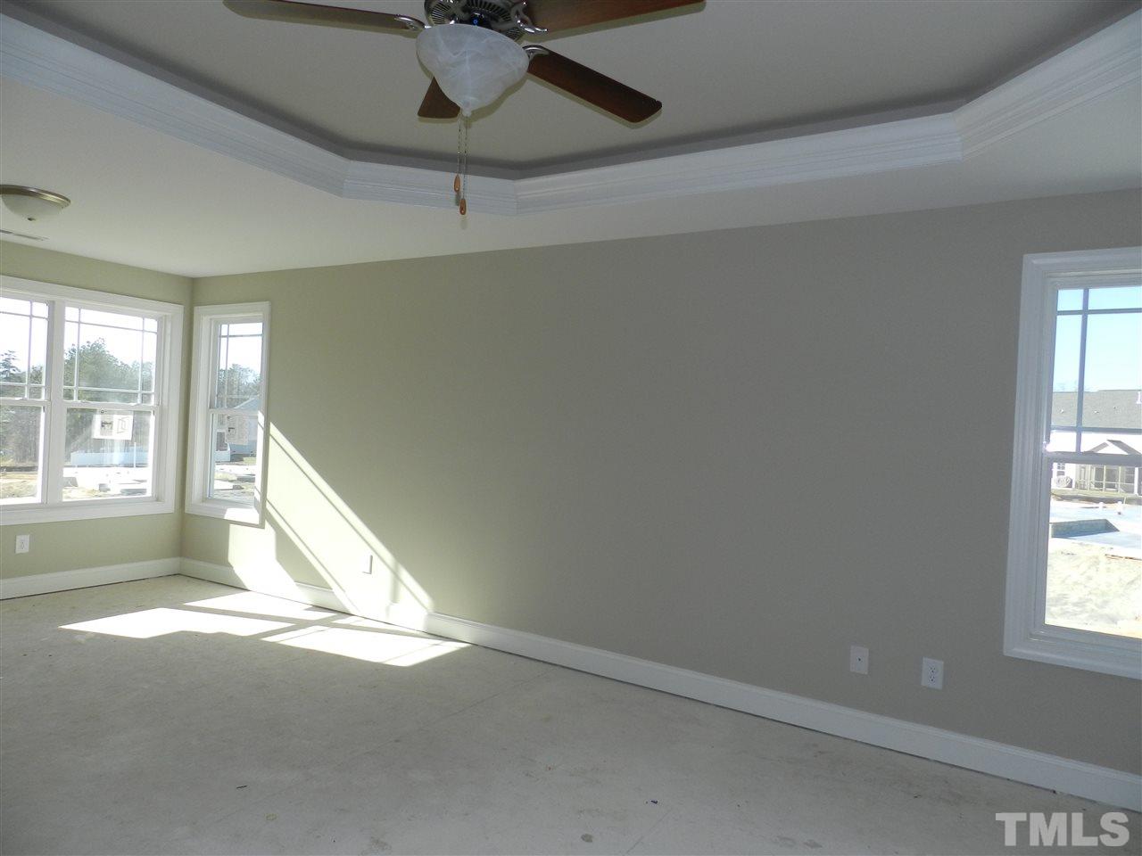 19 Labradoodle Court Garner, NC 27529 - Photo 9 of 9 a view of an empty room and a window