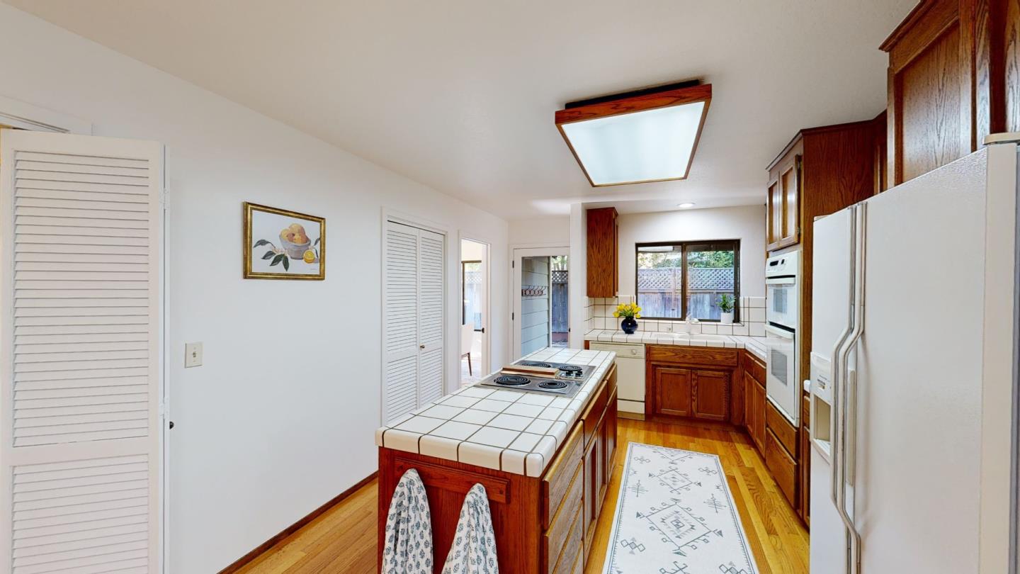 4493 Merlin Way Soquel, CA 95073 - Photo 12 of 52 a room with furniture and a window