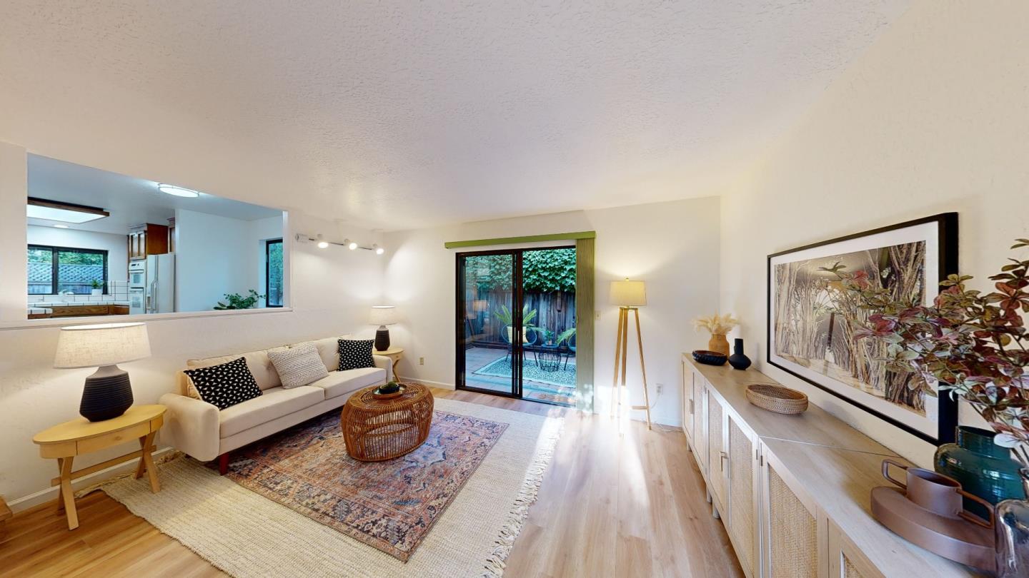 4493 Merlin Way Soquel, CA 95073 - Photo 16 of 52 a living room with furniture and a flat screen tv