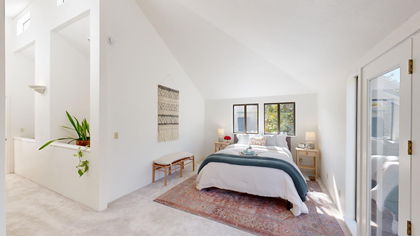 4493 Merlin Way Soquel, CA 95073 - Photo 18 of 52 a bedroom with a bed and a window