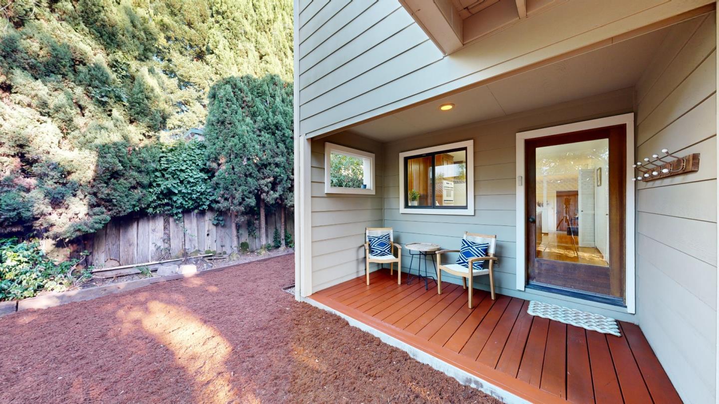 4493 Merlin Way Soquel, CA 95073 - Photo 24 of 52 a backyard of a house with table and chairs