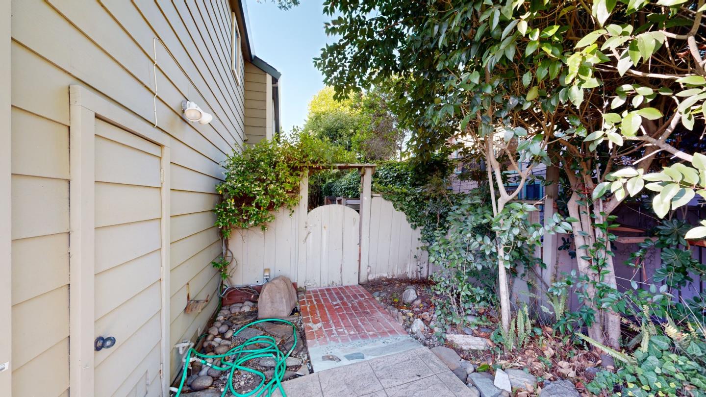 4493 Merlin Way Soquel, CA 95073 - Photo 31 of 52 a backyard of a house with lots of green space