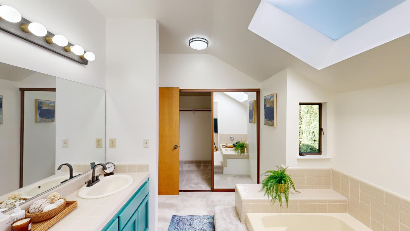 4493 Merlin Way Soquel, CA 95073 - Photo 37 of 52 a bathroom with a sink and a bathtub