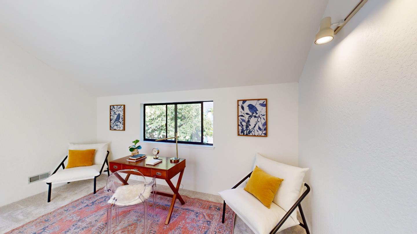 4493 Merlin Way Soquel, CA 95073 - Photo 39 of 52 a living room with a couch and a table