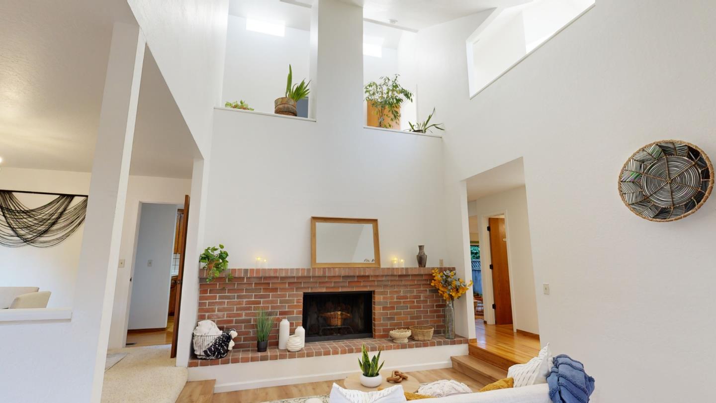 4493 Merlin Way Soquel, CA 95073 - Photo 4 of 52 a living room with furniture and a fireplace