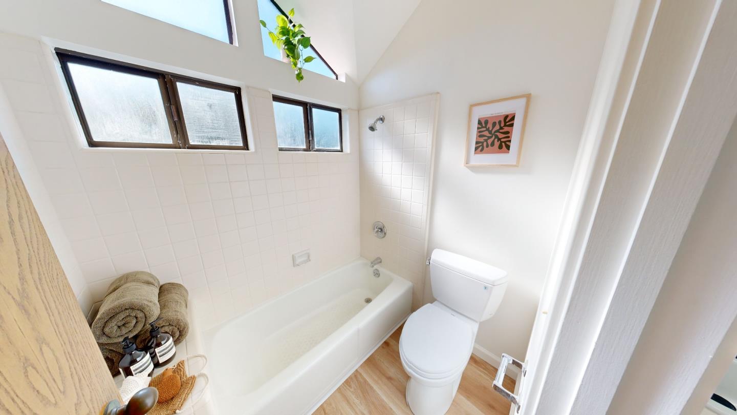 4493 Merlin Way Soquel, CA 95073 - Photo 41 of 52 a bathroom with a toilet and a tub