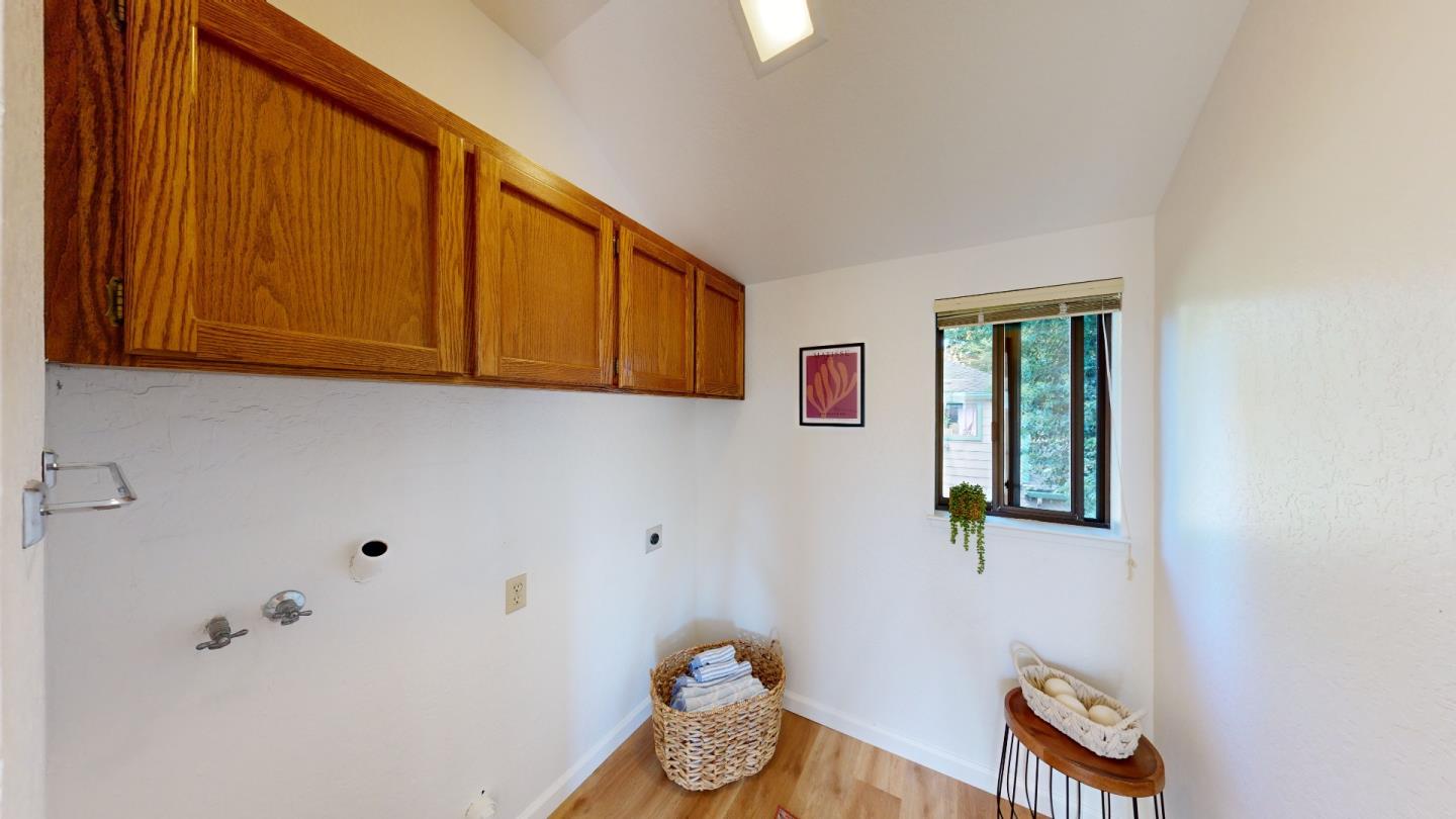 4493 Merlin Way Soquel, CA 95073 - Photo 44 of 52 a bathroom with a sink and mirror